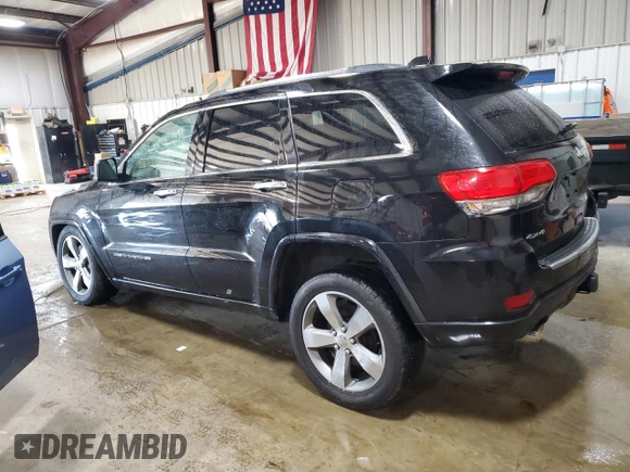 2014 Jeep Grand Cherokee Overland with VIN 1C4RJFCT9EC264594, listed as a Copart auction lot 50071695 with 124,712 mi miles and Clean Title. Bid and sale history available at DreamBid. Image 2.