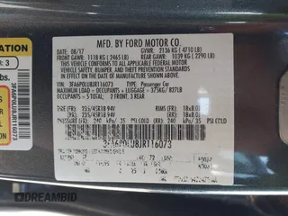 2018 Ford Fusion SE z VIN 3FA6P0LU8JR116073, wystawiony jako IAAI lot #41773037 z przebiegiem 100 864 mil mil oraz . Historia ofert i sprzedaży dostępna na DreamBid. Obrazek 9.