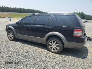 2008 Ford Taurus X SEL with VIN 1FMDK02W08GA29428, listed as a Copart auction lot 58902675 with 256,008 mi miles and Salvage title. Bid and sale history available at DreamBid. Image 2.