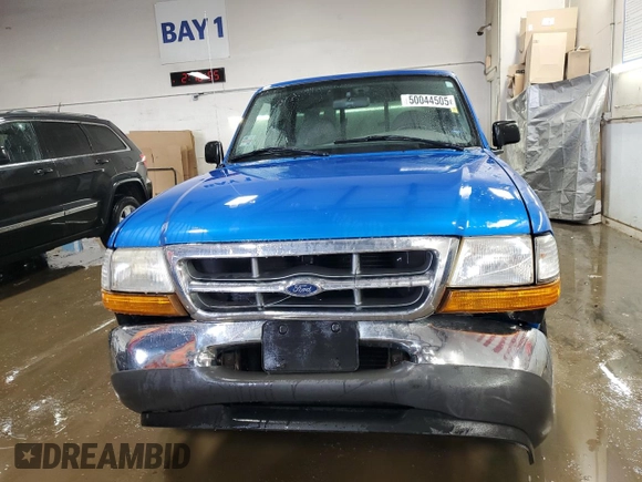 1999 Ford Ranger XLT with VIN 1FTYR10X0XUA52307, listed as a Copart auction lot 50044505 with 94,457 mi miles and Salvage title. Bid and sale history available at DreamBid. Image 5.