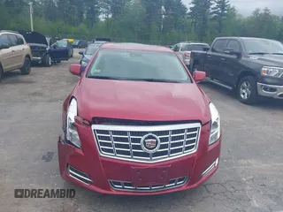 2013 Cadillac XTS Luxury z VIN 2G61R5S38D9229278, wystawiony jako IAAI lot #42321672 z przebiegiem 89 537 mil mil oraz . Historia ofert i sprzedaży dostępna na DreamBid. Obrazek 13.