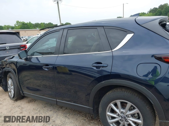 2023 Mazda CX-5 S Carbon Edition z VIN JM3KFBCM6P0251947, wystawiony jako IAAI lot #42286595 z przebiegiem 9 434 mil mil oraz . Historia ofert i sprzedaży dostępna na DreamBid. Obrazek 14.