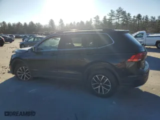 2019 Volkswagen Tiguan SE with VIN 3VV2B7AXXKM087236, listed as a Copart auction lot 82528214 with 0 mi miles and Salvage Title. Bid and sale history available at carsss.com. Image 2.