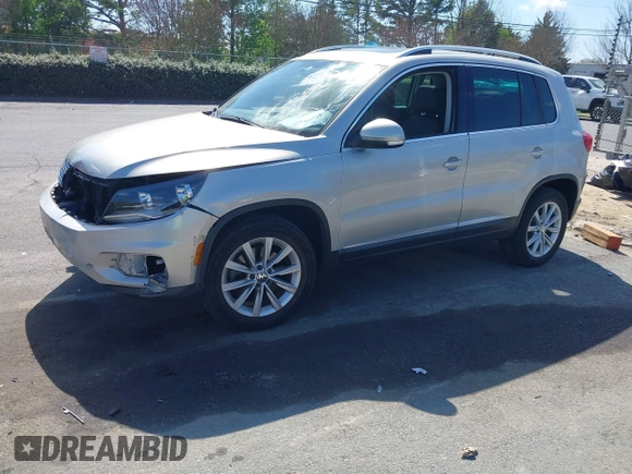 2015 Volkswagen Tiguan SE with VIN WVGAV7AX0FW544218, listed as a IAAI auction lot 41897418 with 97,235 mi miles and . Bid and sale history available at DreamBid. Image 18.