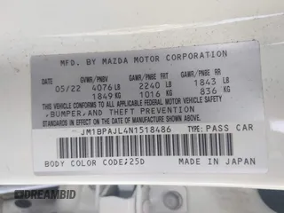 2022 Mazda 3 S with VIN JM1BPAJL4N1518486, listed as a IAAI auction lot 42229314 with 23,235 mi miles and . Bid and sale history available at DreamBid. Image 9.
