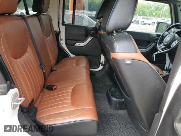 2014 Jeep Wrangler Unlimited Rubicon with VIN 1C4HJWFG4EL114743, listed as a Copart auction lot 61397575 with 110,222 mi miles and Salvage title. Bid and sale history available at DreamBid. Image 10.