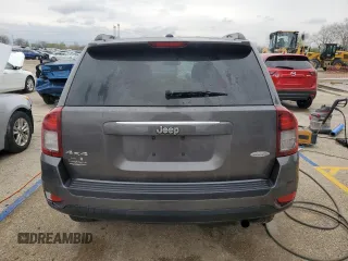 2014 Jeep Compass Latitude with VIN 1C4NJDEB4ED904731, listed as a Copart auction lot 51809165 with 104,760 mi miles and Salvage Title. Bid and sale history available at DreamBid. Image 6.