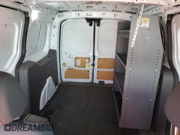 2020 Ford Transit Connect XL с VIN NM0LS7E20L1467554, выставлен на аукционе Copart как лот 58410655 с пробегом 51 072 миль миль и Списание • Salvage title. История ставок и продаж доступна на DreamBid. Изображение 10.