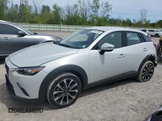 2019 Mazda CX-3 Touring z VIN JM1DKFC76K1451342, wystawiony jako Copart lot #58413935 z przebiegiem 21 391 mil mil oraz Szkoda całkowita • Salvage title. Historia ofert i sprzedaży dostępna na DreamBid. Obrazek 1.