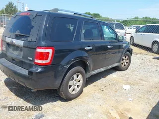2010 Ford Escape Limited with VIN 1FMCU9EG5AKA64242, listed as a IAAI auction lot 42408164 with 162,323 mi miles and . Bid and sale history available at DreamBid. Image 4.