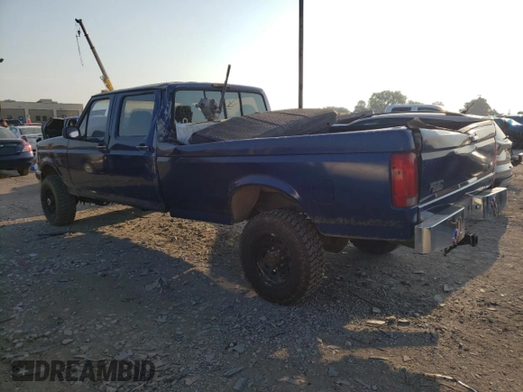 1997 Ford F-350 with VIN 1FTJW36F0VEC59307, listed as a Copart auction lot 62430515 with 199,894 mi miles and Salvage title. Bid and sale history available at DreamBid. Image 2.