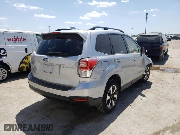2018 Subaru Forester Premium with VIN JF2SJADC4JH575111, listed as a Copart auction lot 39692882 with 23,443 mi miles and . Bid and sale history available at DreamBid. Image 4.