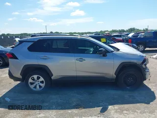2019 Toyota RAV4 LE with VIN 2T3H1RFV5KC003323, listed as a IAAI auction lot 42457237 with 107,554 mi miles and . Bid and sale history available at DreamBid. Image 14.