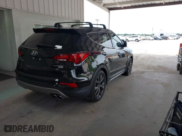 2018 Hyundai Santa Fe Ultimate z VIN 5NMZW4LA6JH054308, wystawiony jako IAAI lot #42385503 z przebiegiem 108 004 mil mil oraz . Historia ofert i sprzedaży dostępna na DreamBid. Obrazek 4.