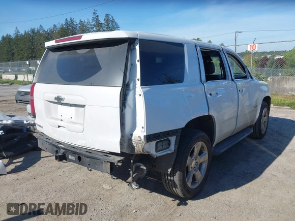 2016 Chevrolet Tahoe LT with VIN 1GNSKBKC9GR272257, listed as a IAAI auction lot 42193967 with 101,967 mi miles and . Bid and sale history available at DreamBid. Image 4.