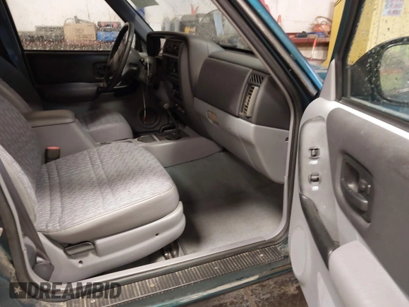 1997 Jeep Cherokee Sport with VIN 1J4FJ68S9VL594152, listed as a IAAI auction lot 41732573 with 65,316 mi miles. Bid and sale history available at carsss.com. Image 5.