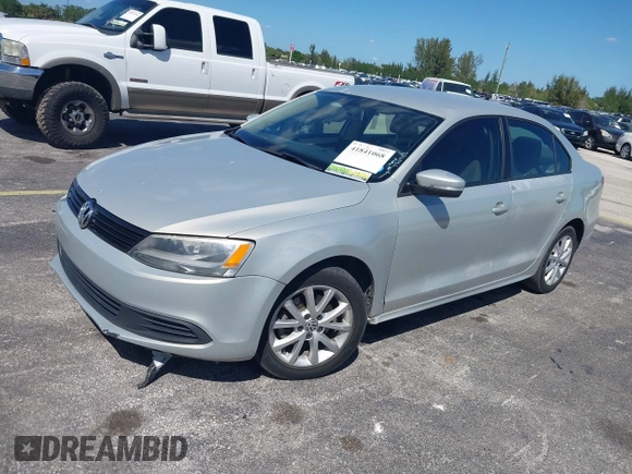 2011 Volkswagen Jetta SE with VIN 3VWDX7AJ4BM330363, listed as a IAAI auction lot 41841068 with 154,676 mi miles and . Bid and sale history available at DreamBid. Image 2.