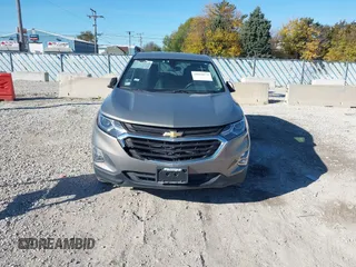 2018 Chevrolet Equinox LT z VIN 3GNAXSEV7JS621706, wystawiony jako IAAI lot #40760827 z przebiegiem 36 051 mil mil oraz . Historia ofert i sprzedaży dostępna na DreamBid. Obrazek 12.