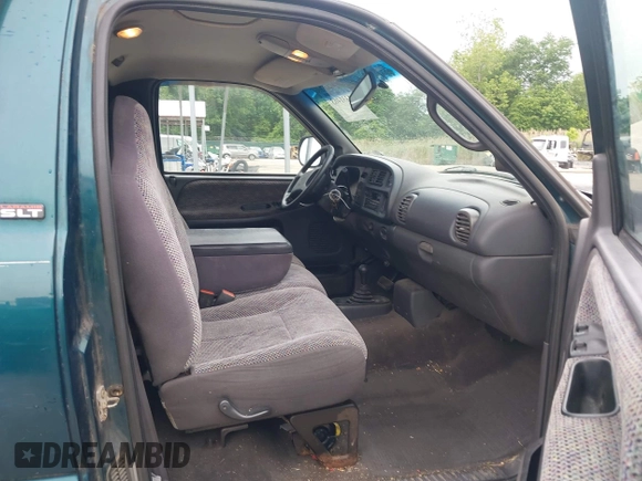 1999 Dodge 1500 z VIN 1B7HF16Z6XS286934, wystawiony jako IAAI lot #42331463 z przebiegiem 115 595 mil mil oraz . Historia ofert i sprzedaży dostępna na DreamBid. Obrazek 5.