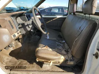 1987 Nissan Hardbody E z VIN JN6ND11S4HW011430, wystawiony jako Copart lot #81785214 z przebiegiem 334 566 mil mil oraz Tytuł czysty. Historia ofert i sprzedaży dostępna na DreamBid. Obrazek 7.