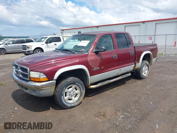 2002 Dodge Dakota z VIN 1B7HG48X92S626936, wystawiony jako IAAI lot #42192429 z przebiegiem 170 746 mil mil oraz . Historia ofert i sprzedaży dostępna na DreamBid. Obrazek 2.