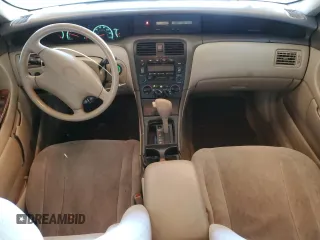 2001 Toyota Avalon XL with VIN 4T1BF28B71U123194, listed as a Copart auction lot 84050604 with 199,807 mi miles and Salvage Title. Bid and sale history available at DreamBid. Image 8.