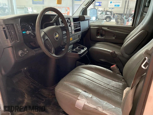 2014 Chevrolet Express Cargo with VIN 1GCWGFCA2E1184095, listed as a IAAI auction lot 42725036 with 270,636 mi miles and . Bid and sale history available at DreamBid. Image 17.