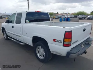 2006 GMC Sierra 1500 SLE1 with VIN 1GTEK19BX6Z180215, listed as a IAAI auction lot 41548959 with 394,076 mi miles. Bid and sale history available at carsss.com. Image 3.