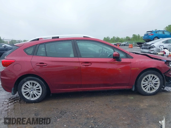 2018 Subaru Impreza Premium z VIN 4S3GTAB63J3720910, wystawiony jako IAAI lot #42331367 z przebiegiem 59 216 mil mil oraz . Historia ofert i sprzedaży dostępna na DreamBid. Obrazek 13.