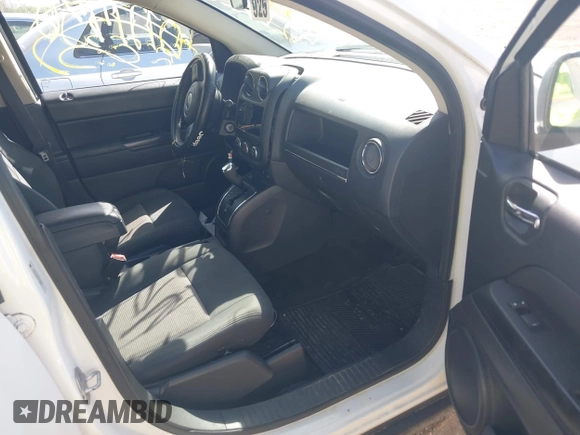 2012 Jeep Compass Latitude with VIN 1C4NJCEA7CD639298, listed as a IAAI auction lot 42121430 with 166,409 mi miles. Bid and sale history available at carsss.com. Image 5.