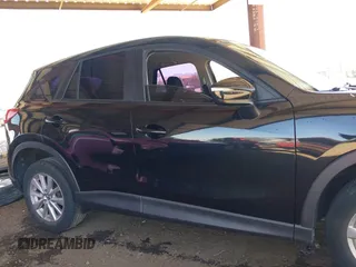 2016 Mazda CX-5 Sport with VIN JM3KE4BY8G0829002, listed as a IAAI auction lot 42553846 with 103,231 mi miles and . Bid and sale history available at DreamBid. Image 14.