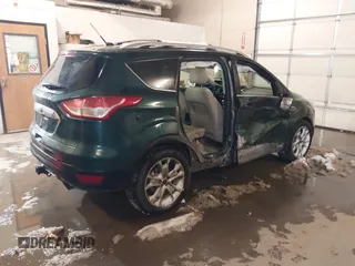 2014 Ford Escape Titanium with VIN 1FMCU9J93EUB95638, listed as a IAAI auction lot 41481089 with 182,258 mi miles. Bid and sale history available at carsss.com. Image 4.