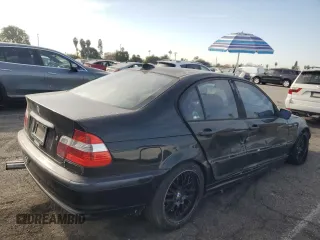 2002 BMW 3 Series 330i with VIN WBAEV53452KM00658, listed as a Copart auction lot 82062874 with 106,031 mi miles and Salvage Title. Bid and sale history available at carsss.com. Image 3.