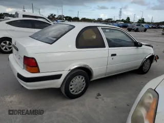 1996 Toyota Tercel DX z VIN JT2AC52L5T0158041, wystawiony jako Copart lot #80121114 z przebiegiem 35 691 mil mil oraz Szkoda całkowita • Salvage title. Historia ofert i sprzedaży dostępna na DreamBid. Obrazek 3.