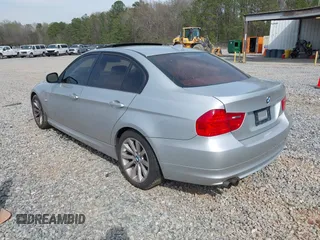 2011 BMW 3 Series 328i with VIN WBAPH7G59BNN05247, listed as a IAAI auction lot 41806543 with 174,944 mi miles. Bid and sale history available at carsss.com. Image 3.