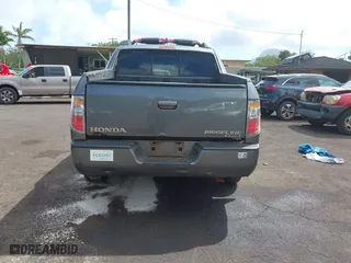 2008 Honda Ridgeline RTL with VIN 2HJYK16548H517715, listed as a IAAI auction lot 41818060 with 239,399 mi miles. Bid and sale history available at carsss.com. Image 16.