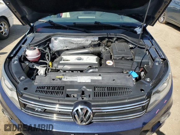 2015 Volkswagen Tiguan SE with VIN WVGAV7AX2FW094359, listed as a Copart auction lot 60101885 with 106,305 mi miles and Salvage title. Bid and sale history available at DreamBid. Image 12.