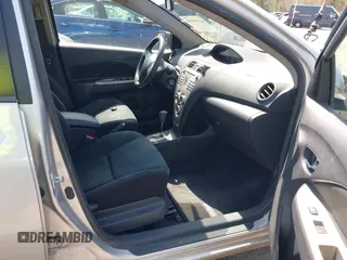 2009 Toyota Yaris with VIN JTDBT903X91300439, listed as a IAAI auction lot 42105998 with 195,880 mi miles. Bid and sale history available at carsss.com. Image 5.