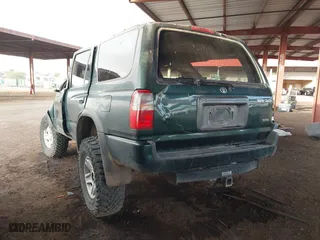 1999 Toyota 4Runner SR5 with VIN JT3HN86R0X0230192, listed as a IAAI auction lot 41279545 with 239,921 mi miles. Bid and sale history available at carsss.com. Image 3.