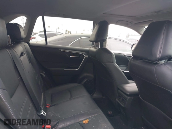 2023 Toyota RAV4 Hybrid XLE Premium with VIN 4T3B6RFV9PU117919, listed as a IAAI auction lot 42528322 with 27,236 mi miles and . Bid and sale history available at DreamBid. Image 8.