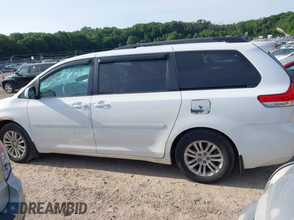 2011 Toyota Sienna XLE AAS with VIN 5TDYK3DC1BS026108, listed as a IAAI auction lot 42681177 with 201,873 mi miles and . Bid and sale history available at DreamBid. Image 14.