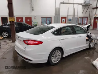 2015 Ford Fusion SE Hybrid with VIN 3FA6P0LU1FR225241, listed as a IAAI auction lot 42349797 with 85,725 mi miles and . Bid and sale history available at DreamBid. Image 4.