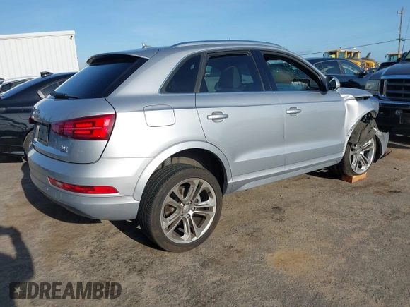 2017 Audi Q3 Premium Plus z VIN WA1JCCFSXHR000319, wystawiony jako IAAI lot #41986889 z przebiegiem 74 675 mil mil oraz . Historia ofert i sprzedaży dostępna na DreamBid. Obrazek 4.