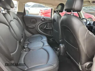 2014 MINI Countryman S with VIN WMWZC3C56EWP25479, listed as a Copart auction lot 61197525 with 101,146 mi miles and Salvage title. Bid and sale history available at DreamBid. Image 10.