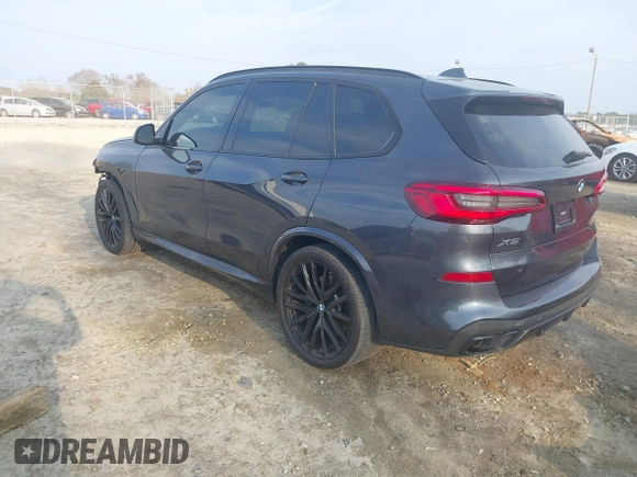 2020 BMW X5 sDrive40i with VIN 5UXCR4C06LLW64438, listed as a IAAI auction lot 41520407 with 89,868 mi miles and . Bid and sale history available at DreamBid. Image 3.