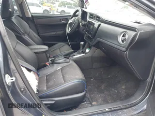 2018 Toyota Corolla L with VIN 5YFBURHE1JP814781, listed as a IAAI auction lot 42408378 with 115,543 mi miles and . Bid and sale history available at DreamBid. Image 5.