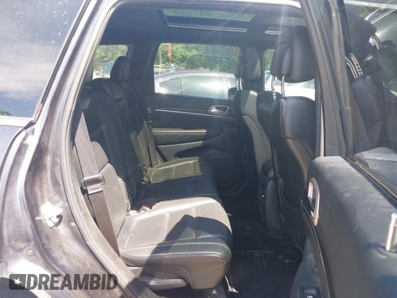 2014 Jeep Grand Cherokee Limited z VIN 1C4RJFBG3EC266491, wystawiony jako IAAI lot #42319864 z przebiegiem 156 873 mil mil oraz . Historia ofert i sprzedaży dostępna na DreamBid. Obrazek 8.