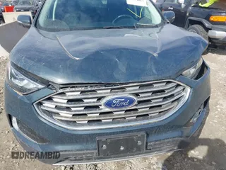 2019 Ford Edge SEL z VIN 2FMPK4J9XKBC58603, wystawiony jako IAAI lot #41814067 z przebiegiem 135 198 mil mil oraz . Historia ofert i sprzedaży dostępna na DreamBid. Obrazek 6.