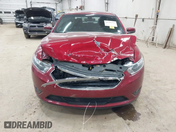 2015 Ford Taurus SEL z VIN 1FAHP2H88FG163179, wystawiony jako IAAI lot #42345579 z przebiegiem 142 424 mil mil oraz . Historia ofert i sprzedaży dostępna na DreamBid. Obrazek 12.