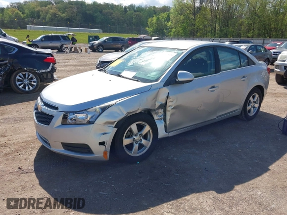 2014 Chevrolet Cruze 1LT with VIN 1G1PC5SBXE7320337, listed as a IAAI auction lot 42010404 with 69,270 mi miles and . Bid and sale history available at DreamBid. Image 2.